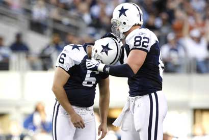 Dallas Cowboys kicker Nick Folk gets consoled by Jason Witten after a miss against the Oakland Raiders.