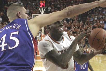 Kansas' Cole Aldrich rejects a shot attempt in the first half of the Jayhawks' win over Texas.