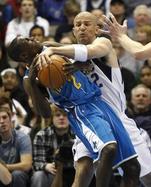 Dallas' Jason Kidd goes after the ball against New Orleans' Darren Collison (left), causing a jump ball. Collison finished with 35 points on 15-of-21 shooting.