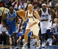 Dallas' Jason Kidd dribbles down court against New Orleans in the second half.