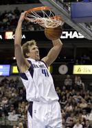 Dallas Mavericks forward Dirk Nowitzki (41) dunks against New Orleans during the fourth quarter.