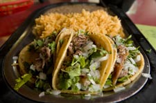 Carnitas tacos with rice and beans at Taquerias Pedrito's.