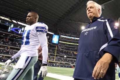Dallas CB Terence Newman (left) and head coach Wade Phillips leave the field after the Cowboys 20-17 loss to the San Diego Chargers.