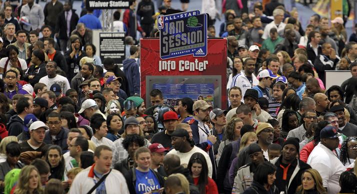 Basketball fans line up to get into All-Star team practice at the NBA Fan Jam during NBA All-Star weekend at the Dallas Convention Center in Dallas on Saturday, February 13, 2010.