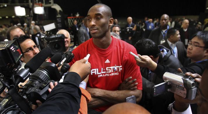 West All-Star Kobe Bryant, who is injured and will not play, talks with the media after All-Star team practice at the NBA Fan Jam during NBA All-Star weekend