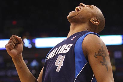 Caron Butler, one of the Mavericks' three new players after the trade of Josh Howard, reacts to missing a shot close to the basket.
