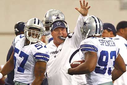 The Cowboys were happy when Anthony Spencer (right) wrapped up Sunday's win with an interception.