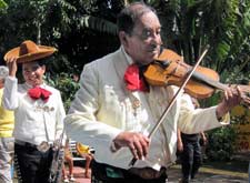 Mariachis wear clothing similar to that of the charro, or cowboy, with silver or other shiny concho studs.