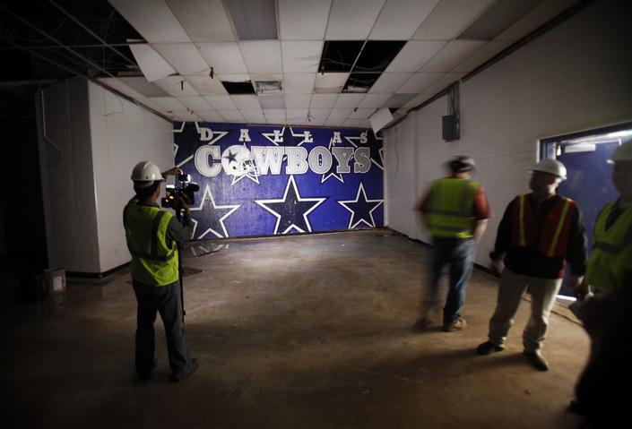 The Dallas Cowboys mural in the interview room is one of the few remaining painted walls to be sand blasted by demolition crews.