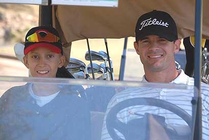 Texas Rangers third baseman Michael Young became friends with Carson Leslie (left) and his family.