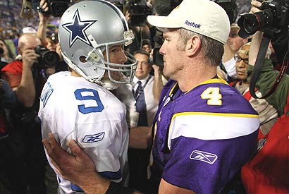 Brett Favre (right) consoles Cowboys quarterback Tony Romo after the Vikings ended Dallas' season in the divisional playoff round.