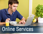 A picture of a man and a woman using DMV Online Services