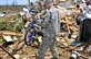 U.S. Army Spc. Robert Boettner carries a child's bike from the rubble of a home in the Crescent Ridge area of Tuscaloosa, Ala., April 30, 2011. Boettner is assigned to the 31st Chemical Brigade. U.S. Army photo by Spc. Katherine Dowd