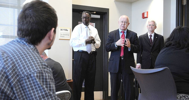 Dr. Petzel speaking with VA employees and Veterans