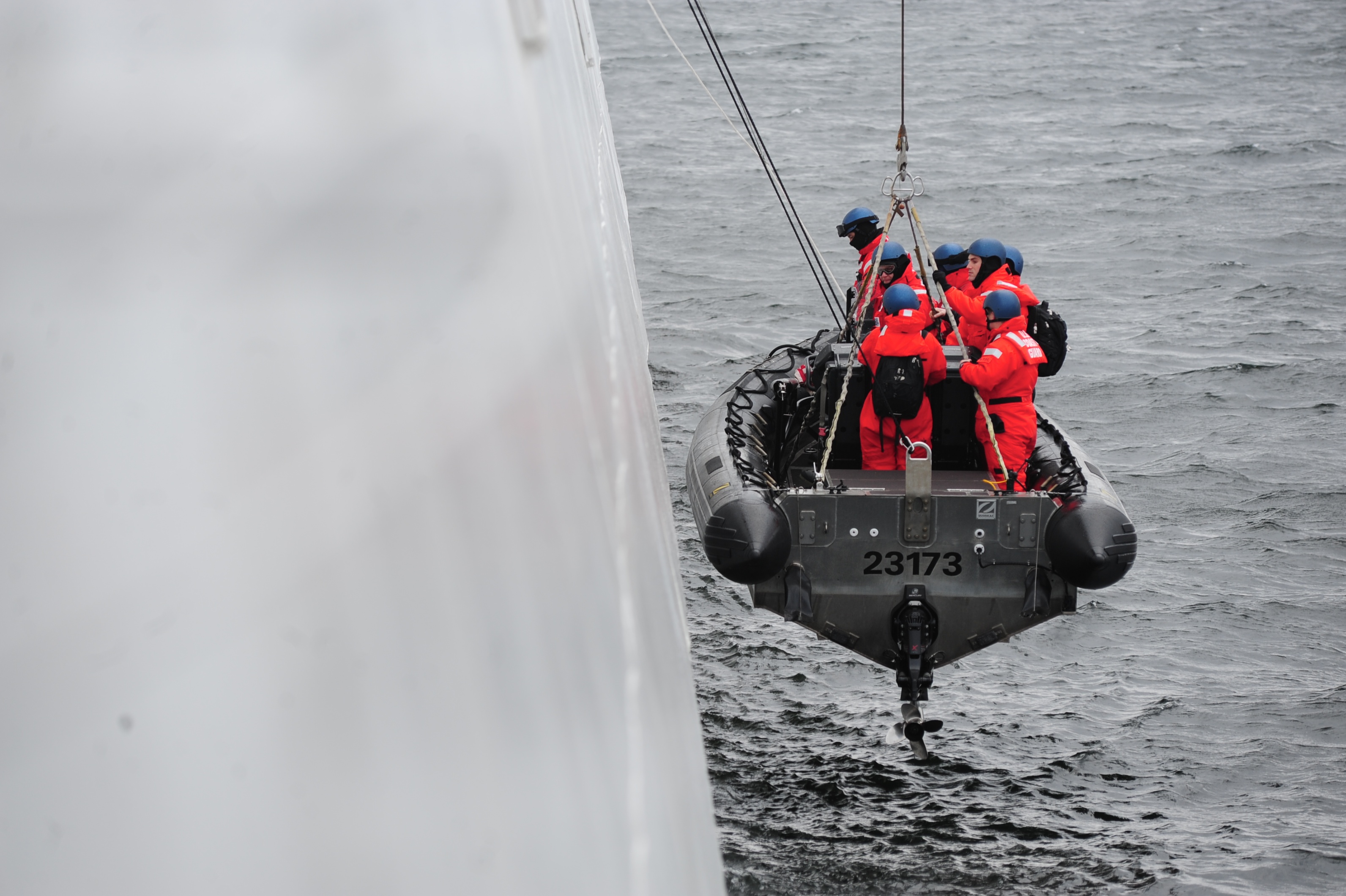 Coast Guard Cutter Bertholf has two ways to launch their small boat - one from the side and one from the stern. Here, a boatcrew is  launched from the side davit. U.S. Coast Guard photo by Petty Officer 3rd Class Jonathan Lally.