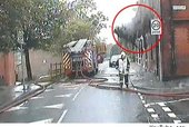 VIDEO: Firefighter has lucky escape from house collapse, walks away calmly