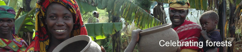 Batwa women and children show their pottery wares, Burundi 