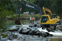 Service staff work to remove barriers to fish passage at the Octoraro Creek Dam in Cecil County, MD. Credit: USFWS