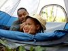 Photo: A father and son in a tent