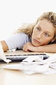 Woman with paperwork © Getty Images