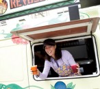 Jessie Kennedy shows off her new truck — along with a Carrotini and a Purple Rain.