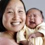 Portrait of Korean Mom iwth her 6 week old baby girl