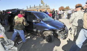 Several people injured after van crashes, flips into Veterans Day parade crowd in downtown Huntsville