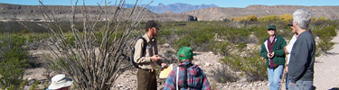 An SCA intern leads a nature walk