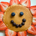 colorful plate with smiley face