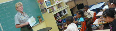 NPS Ranger with students in classroom