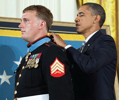 WASHINGTON D.C. — On Sept. 15, President Barack Obama draped the pale blue ribbon suspending the Medal of Honor around the neck of Sgt. Dakota L. Meyer, the first living Marine to receive the award for actions in Iraq or Afghanistan. Photo by Pete Souza, U. S. White House