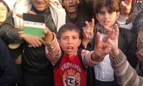 Boy shouts during a protest against Syria's President Bashar al-Assad