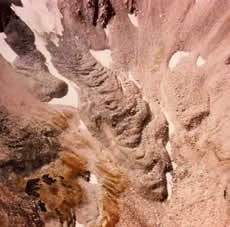 Frying Pan Glacier, Colorado, is almost entirely covered by rocks and debris in this photograph from 1966. (Photo courtesy of George L. Snyder, archived at the World Data Center for Glaciology, Boulder, CO.)