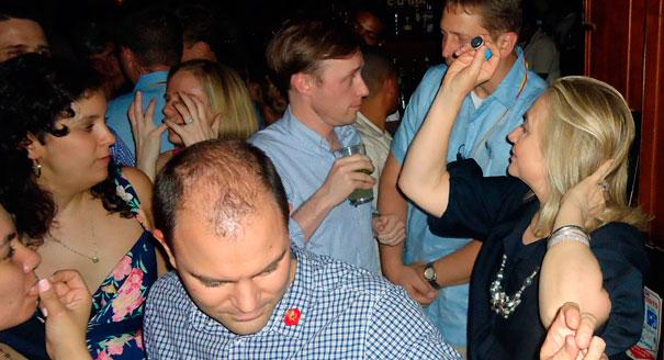 U.S. Secretary of State Hillary Clinton dances with members of her delegation in the Cafe Havana salsa bar during a break from the Americas Summit in Cartagena. Clinton went dancing after midnight at the bar known for its Cuban music after a day of diplomacy at the summit. | Reuters