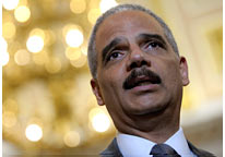 Image: Attorney General Eric Holder speaking to reporters on Capitol Hill in Washington, DC, on Tuesday (© Susan Walsh/AP)