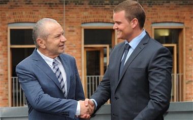 Lord Sugar congratulates Ricky Martin (right), the winner of the BBC television programme The Apprentice