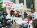 Part of a group of about 100 protesters gather outside the East County Courthouse, 05 May 1992 in Simi Valley, to protest the verdict in the trial of the four police officers who were acquitted in the Rodney King case. The 1992 Los Angeles riots, with looting and arson events, erupted 29 April 1992 when a mostly white jury acquitted the four police officers accused in the videotaped beating of black motorist Rodney King, after he fled from police. 52 people were killed during the riots and Rodney King became a reluctant symbol of police brutality.        (credit: HAL GARB/AFP/GettyImages)