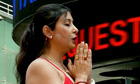 Summer solstice draws thousands of yogis to Times Square  – video