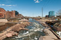Denver Confluence Park - Confluence of Platte River and Cherry Creek showing people enjoying the park 