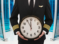 Pilot Holding Clock