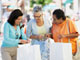 women with shopping bags