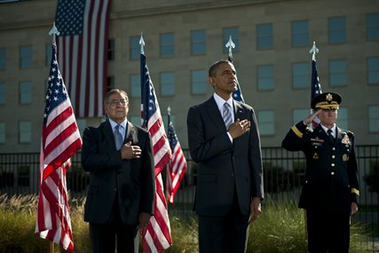 Defense Secretary Leon E. Panetta, President Barack Obama and Army Gen. Martin E. Dempsey, chairman of the Joint Chiefs of Staff, render honors as the national anthem plays during the ceremony to commemorate the 11th anniversary of the 9/11 terrorist attacks at the Pentagon, Sept. 11, 2012. 