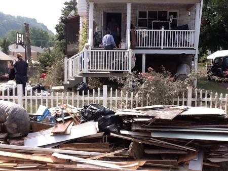 Rep. Barletta enters a flood-damaged home in West Nanticoke, Plymouth Township, Luzerne County, Wednesday afternoon