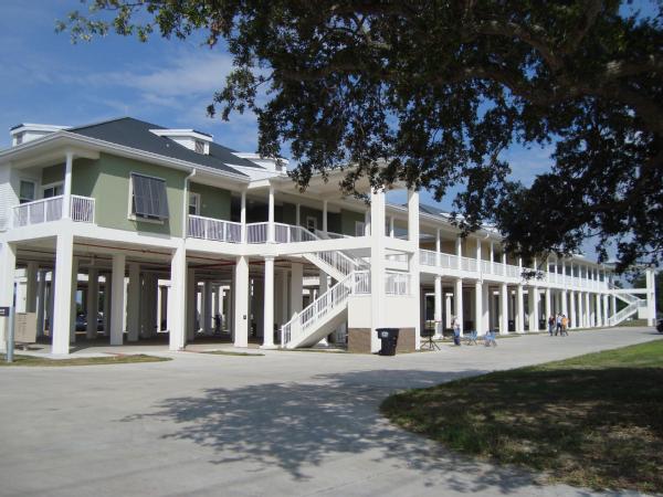 Plaquemines Parish, La., Aug. 6, 2012 -- Photo of the Plaquemines Parish Faculty Housing project which celebrated its opening on August 6, 2012. FEMA obligated $8 million to this project which replaced housing destroyed by Hurricane Katrina. The project was elevated to comply with the new Digital Flood Insurance Rate Map elevation for the area, which is in south Plaquemines Parish. FEMA has obligated a total of $206 million to the Plaquemines Parish School Board to rebuild its schools following Hurricanes Katrina, Rita, Gustav and Ike. 