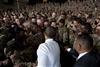 President Obama wades into a crowd of soldiers for handshakes 