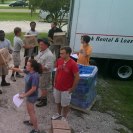 Photo: NCCC - Delta 6 members unloading supplies at the Hammond Westside Upper Elementary shelter in Hammond, LA.