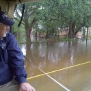 Photo: August 30 - FEMA Administrator Craig Fugate surveys flooding in Madisonville, La. with Louisiana Governor Bobby Jindal. (Photo courtesy of Louisiana Governor's Office of Homeland Security and Emergency Preparedness)