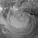 Photo: (Image courtesy of NASA) Early on August 28, 2012, the Visible Infrared Imaging Radiometer Suite (VIIRS) on the Suomi-NPP satellite captured this nighttime view of Tropical Storm Isaac and the cities near the Gulf Coast of the United States. The image was acquired just after local midnight by the VIIRS “day-night band,” which detects light in a range of wavelengths from green to near-infrared and uses light intensification to enable the detection of dim signals. In this case, the clouds of Isaac were lit by moonlight.