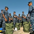 Photo: U.S. Navy staff and students at the Center for Information Dominance Unit Corry Station, Fla., muster early in the morning Aug. 26, 2012, in preparation for Tropical Storm Isaac. The students were directed to pack a sea bag for five days in the event of evacuation. The storm was expected to make landfall along the Gulf Coast the evening of Aug. 28, 2012. The last major storm to affect northwest Florida was Hurricane Dennis, a category-three hurricane, which made landfall near Pensacola July 10, 2005. Isaac developed as a tropical storm over the Western Atlantic Ocean Aug. 21, 2012, affecting Puerto Rico, the Dominican Republic, Haiti and Cuba before making landfall as a hurricane on the Gulf Coast of the United States. (U.S. Navy photo by Gary Nichols/Released)