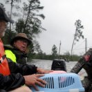 Photo: From The National Guard A Soldier with the Mississippi Army National Guard’s 2nd Battalion, 20th Special Forces Group (Airborne) helps a sheriff's deputy evacuate a local resident and his two dogs from a flooded area along the Mississippi coast during Hurricane Isaac relief operations.(U.S. Army photo by Staff Sgt. David Hamann)